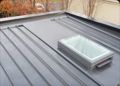 Completed metal roof with skylight and flashing detail in Melbourne