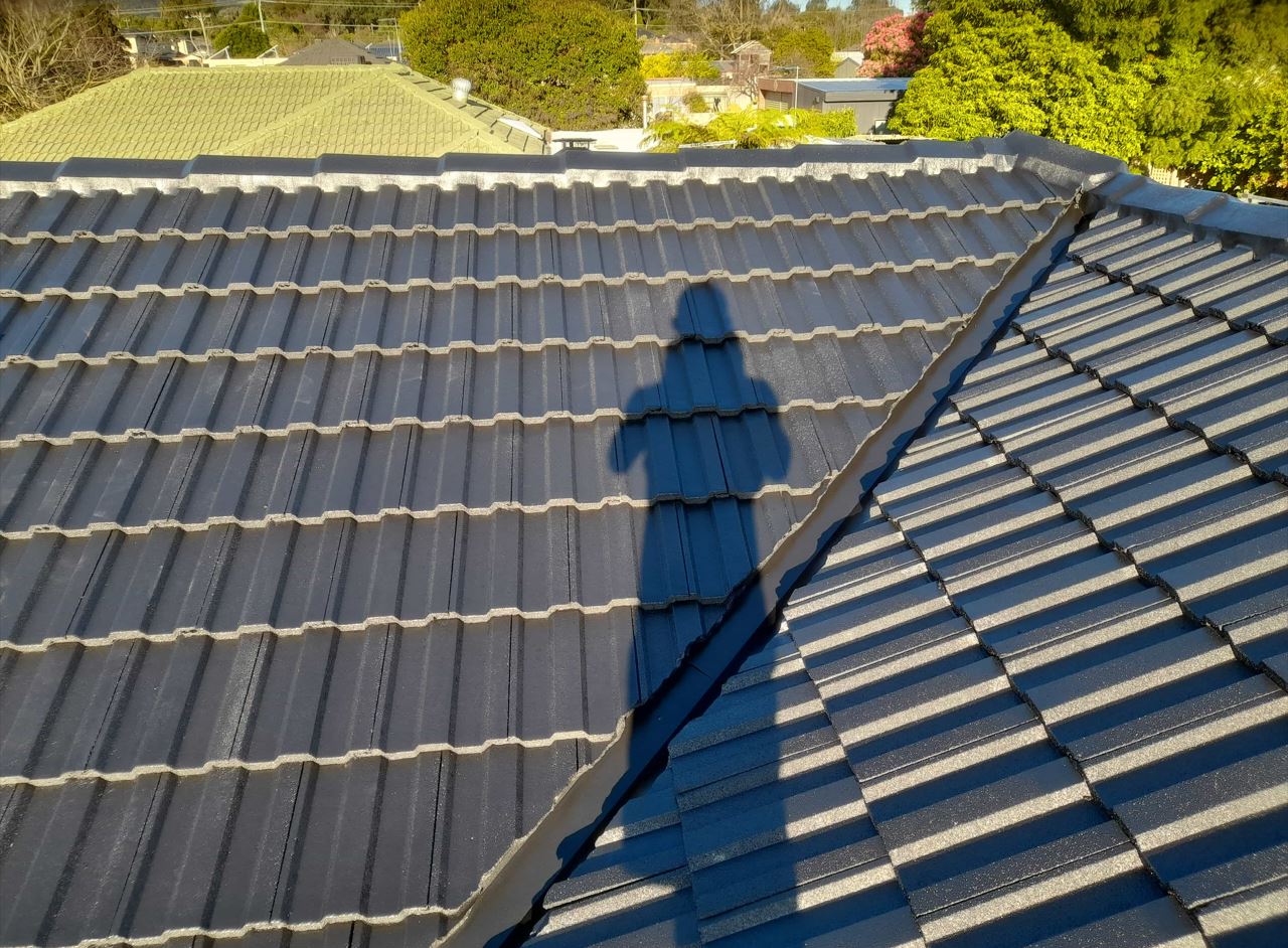 Tiled roof opened along a valley during replacement work